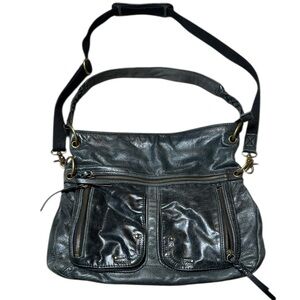 The Sak Black Leather Boho Shoulder Hobo Bag Multi Pocket Tassel Purse